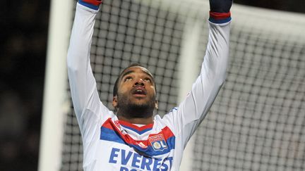 L'attaquant lyonnais Alexandre Lacazette jubile apr&egrave;s avoir marqu&eacute; contre Lorient, &agrave; Lorient (Morbihan) le 11 d&eacute;cembre 2011. (FRANK PERRY / AFP)