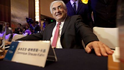 L'ancien directeur du FMI, Dominique Strauss-Kahn, &agrave; l'occasion d'un forum &eacute;conomique &agrave; P&eacute;kin, le 19 d&eacute;cembre 2011. (ED JONES / AFP)