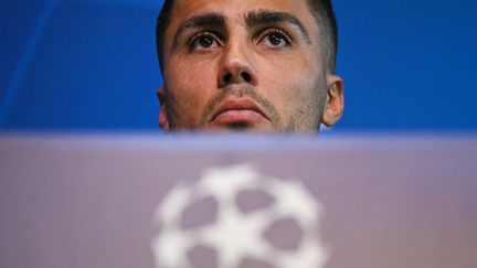 Manchester City midfielder Rodri speaks at a press conference ahead of the English club's Champions League match against Inter Milan on September 17, 2024. (OLI SCARFF / AFP)