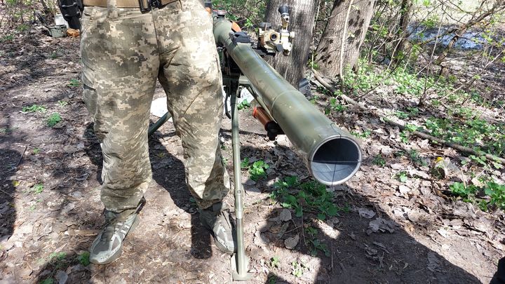 A Ukrainian soldier next to the SPG-9 anti-tank gun, which can fire up to 4.5 km away at infantry.  (AGATHE MAHUET / RADIO FRANCE)