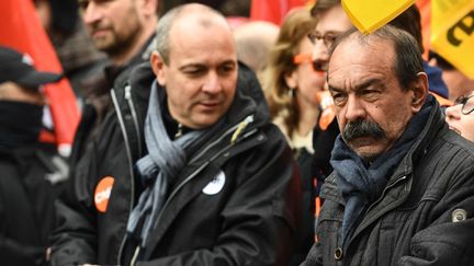 Le secrétaire général de la CFDT Laurent Berger et celui de la CGT Philippe Martinez lors d'une manifestation contre la réforme des retraites, à Paris, le 11 février 2023. (CHRISTOPHE ARCHAMBAULT / AFP)