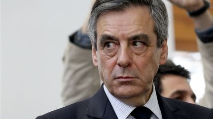 L'ambiance pas à la détente, d'après le député Pierre Lelouche, qui s'est vu arracher le micro des mains alors qu'il tentait de prendre la parole. (FRANCOIS NASCIMBENI / AFP)