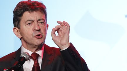 Le candidat du Front de Gauche &agrave; la pr&eacute;sidentielle Jean-Luc M&eacute;lenchon, lors de l'inauguration de son QG de campagne, le 18 octobre 2011 &agrave; Paris. (PATRICK KOVARIK / AFP)