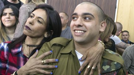 Le soldat israélien Elor Azaria lors de l'énoncé de sa condamnation par un tribunal militaire à Tel-Aviv (Israël), le 21 février 2017. (JIM HOLLANDER / AFP)