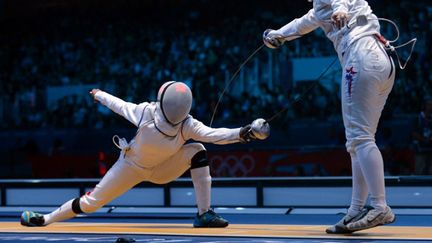 Laura Flessel a atteint les 8èmes de finale (TOSHIFUMI KITAMURA / AFP)