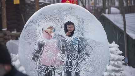 A l'Ice and Snow festival, le 4 janvier 2015, &agrave; la veille de l'inauguration de ce festival annuel de la ville d'Harbin, dans le nord de la Chine. (FRED DUFOUR / AFP)