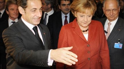 Le couple franco-allemand à Munich, pour la 45e conférence sur la sécurité, le 7 février 2009. (AFP/OLIVER LANG)