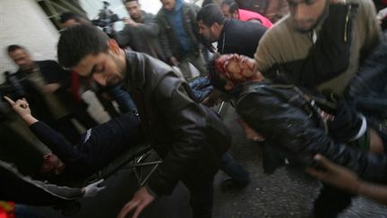 Blessés palestiniens à Gaza (© AFP/YASSER-SAYMEH)