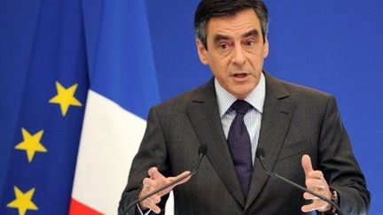 François Fillon donne une conférence de presse depuis l'hôtel Matignon, à Paris, le 14 janvier 2012. (AFP - Miguel Medina)