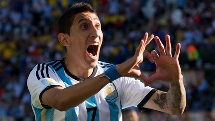 Angel Di Maria exulte apr&egrave;s son but contre la Suisse, mardi 1er juillet &agrave; Sao Paulo (Br&eacute;sil). (  BEN QUEENBOROUGH / BACKPAGE IMAGES LTD / AFP)