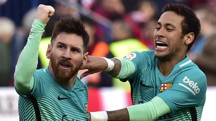 Lionel Messi et Neymar (ici le 26 février 2017 à Barcelone) vont se retrouver sous le même maillot. (GERARD JULIEN / AFP)