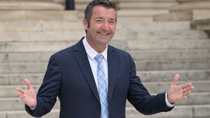 Le député Renaissance Karl Olive arrive pour une journée d'accueil à l'Assemblée nationale après le second tour des élections législatives françaises, le 9 juillet 2024 à Paris. (BERTRAND GUAY / AFP)