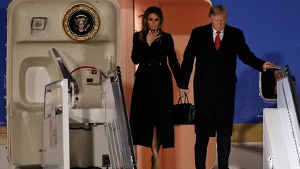 Donald et Melania Trump arrive à l'aéroport d'Orly, le 9 novembre 2018. (CHRISTIAN HARTMANN / REUTERS)