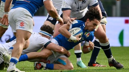 Ange Capuzzo with ball in hand during Italy-Scotland, March 9, 2024.  (Alberto Pizzoli/AFP)