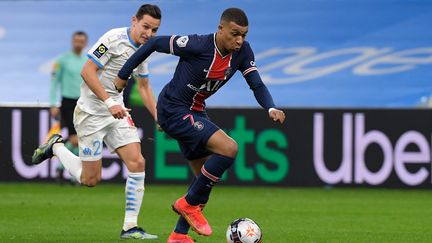 Kylian Mbappé et Florian Thauvin (NICOLAS TUCAT / AFP)