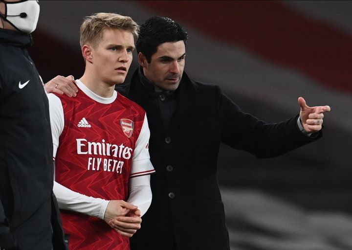 Martin Odegaard and his coach Mikel Arteta, January 30, 2021, during a Premier League match between Arsenal and Manchester United.  (MAXPPP)