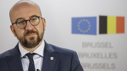 Le Premier ministre belge, Charles Michel, donne une conférence de presse à Bruxelles, le 14 décembre 2018. (THIERRY ROGE / BELGA MAG / AFP)