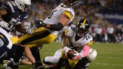 Bell inscrit le TD victorieux face à San Diego (DONALD MIRALLE / GETTY IMAGES NORTH AMERICA)