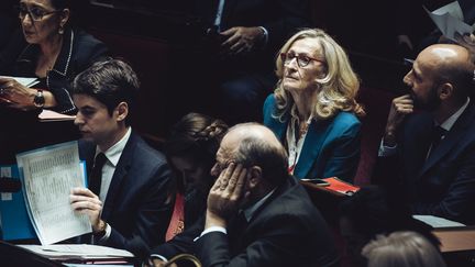 Nicole Belloubet, new Minister of National Education, behind Gabriel Attal, Prime Minister, February 14, 2024 at the National Assembly.  (VIRGINIA HAFFNER / HANS LUCAS)