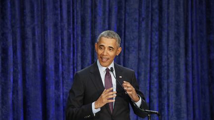 Le président américain Barcak Obama lors d'une cérémonie à Washington (Etats-Unis), le 12 août 2018. (JIM BOURG / REUTERS)