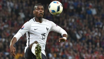 Paul Pogba (équipe de France) contre la Suisse (PHILIPPE HUGUEN / AFP)