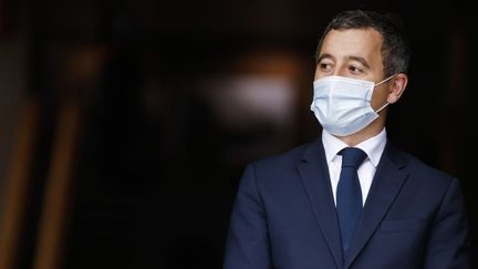 Le ministre de l'Intérieur, Gérald Darmanin, lors d'une visite d'Emmanuel Macron à la préfecture de Seine-Saint-Denis, à Bobigny, le 20 octobre 2020.&nbsp; (LUDOVIC MARIN / POOL / AFP)