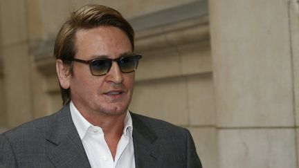 Benoît Magimel se rendant au Palais de Justice le 12 avril 2016 
 (THOMAS SAMSON / AFP)