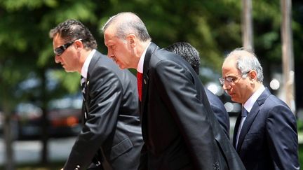 Le Premier ministre turc Recep Erdogan arrive &agrave; une r&eacute;union gouvernementale pour discuter de sanctions possibles&nbsp;&agrave; l'&eacute;gard de la Syrie le 25 juin 2012 &agrave; Ankara (Turquie). (ADEM ALTAN / AFP)