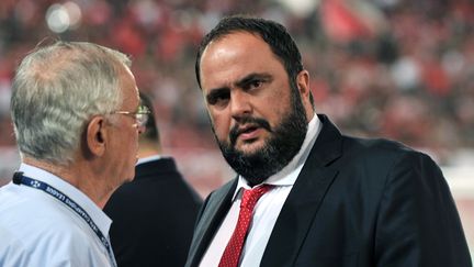 Le président de l'Olympiakos, Evangelos Marinakis, le 17 septembre 2013. (LOUISA GOULIAMAKI / AFP)