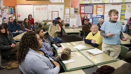 D&eacute;bat dans une &eacute;cole de Seattle (Etat de Washington), lors du caucus de 2008. (STEPHEN BRASHEAR / AFP)