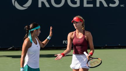 Les joueuses françaises Caroline Garcia et Kristina Mladenovic (MINAS PANAGIOTAKIS / GETTY IMAGES NORTH AMERICA)