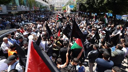 Palestiniens manifestant à l'occasion de la 