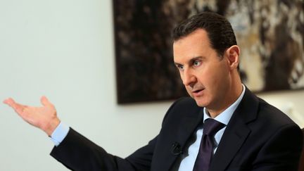 Le président syrien Bachar Al-Assad, ici en février 2016, s'est exprimé auprès de trois médias français dont franceinfo, sur le futur de la Syrie lors de la conférence de paix prévue à Astana, fin janvier.&nbsp; (JOSEPH EID / AFP)