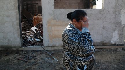 La famille Santiago a perdu une maison dans l'incendie près de Vitrolles (Bouches-du-Rhône), le 11 août 2016.&nbsp; (MAXPPP)