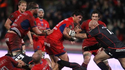 Le Grenoblois Census Johnston fait face au Toulousain Gurhro Steenkamp (à droite) (RAYMOND ROIG / AFP)