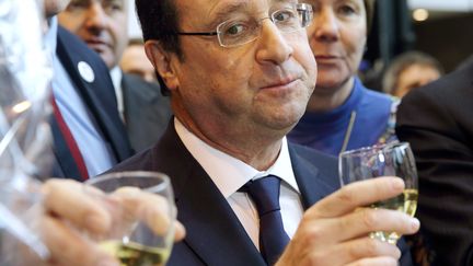 Fran&ccedil;ois Hollande en visite au salon de l'Agriculture, &agrave; Paris, le 22 f&eacute;vrier 2014. (PHILIPPE WOJAZER / AFP)