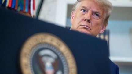 Le président américain, Donald Trump, lors d'une cérémonie dans le Bureau ovale, à la Maison Blanche (Washington), le 7 décembre 2020. (SAUL LOEB / AFP)