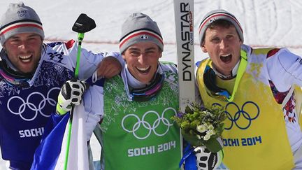 Chapuis Bovolenta et Midol sur le podium du Skicross (ALEXANDER KLEIN / AFP)