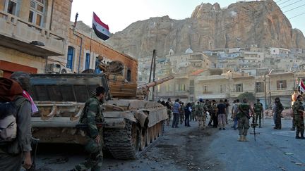 Des troupes de Bachar Al-Assad dans le village chr&eacute;tien de Maalula&nbsp;(Syrie), le 11 septembre 2013. ( AFP)