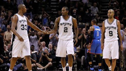 Tony Parker (à dte) et Boris Diaw (à gche), figures de proue du contingent français à San Antonio