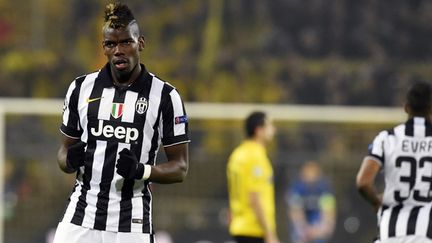 Paul Pogba s'est blessé mercredi soir face à Dortmund.  (TOBIAS SCHWARZ / AFP)