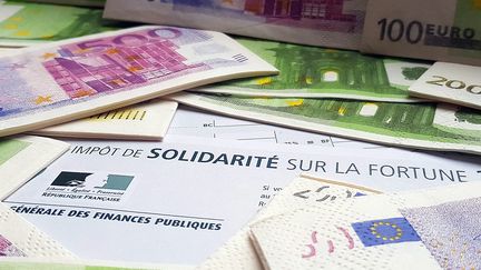 Parmi les grandes fortunes, 77% ont effectué au moins un don à un organisme caritatif en 2018, contre 82% en 2017. (MAXPPP)