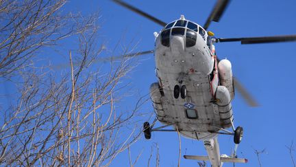 Un hélicoptère&nbsp;Mi-8&nbsp;dans le territoire de&nbsp;Khabarovsk, en Russie, le 21 mars 2018. (IGOR ONUCHIN / SPUTNIK / AFP)