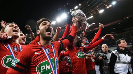 Les joueurs du Stade rennais, vainqueurs de la Coupe de France, le 27 avril 2019 au Stade de France. (ANNE-CHRISTINE POUJOULAT / AFP)