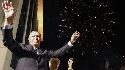 Le président turc Erdogan et sa femme à Ankara (Turquie), le 25 juin 2018. (KAYHAN OZER / AFP)