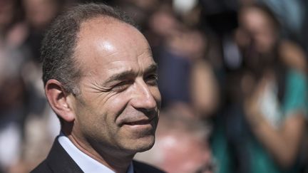 Le pr&eacute;sident de l'UMP, Jean-Fran&ccedil;ois Cop&eacute;, le 8 juillet 2013 au si&egrave;ge de l'UMP, &agrave; Paris. (FRED DUFOUR / AFP)