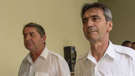 Les pilotes, Pascal Fauret et Bruno Odos, au tribunal de Saint Domingue (République dominicaine), le 12 mai 2014. (ERIKA SANTELICES / AFP)