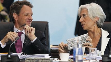 Le secrétaire du trésor Timothy Geithner et la ministre des Fiances Christine Lagarde, lors du G20. (AFP - Andy Wong)