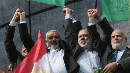 Ismail Haniyeh (left), the political leader of Hamas, in Gaza, on November 22, 2012. He was killed by a strike, which Iran attributes to Israel, in Tehran, on Wednesday, July 31. (MAHMUD HAMS / AFP)