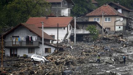 En se retirant, l'eau laisse place &agrave; des paysages de d&eacute;solation, comme ucu, &agrave; Topcic Polje, en Bosnie, vendredi 16 mai.&nbsp; (DADO RUVIC / REUTERS )